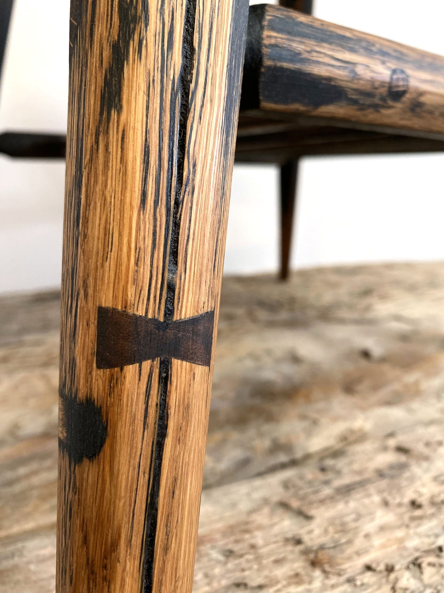 Modern rustic mid-century coffee or side table with traditional joinery and natural grain surface texture