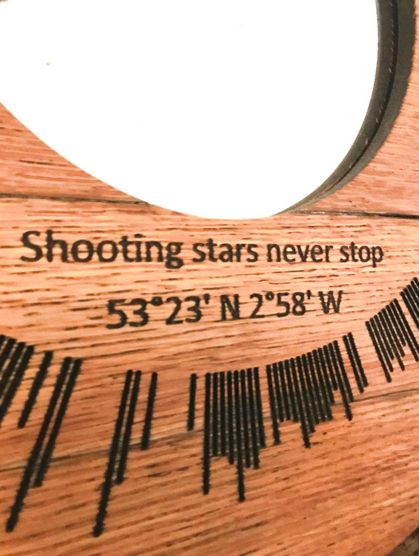 Personalized fitness wall art made from reclaimed oak whisky barrel lids. Transform your workout data into a sustainable piece of home decor that highlights your personal fitness journey