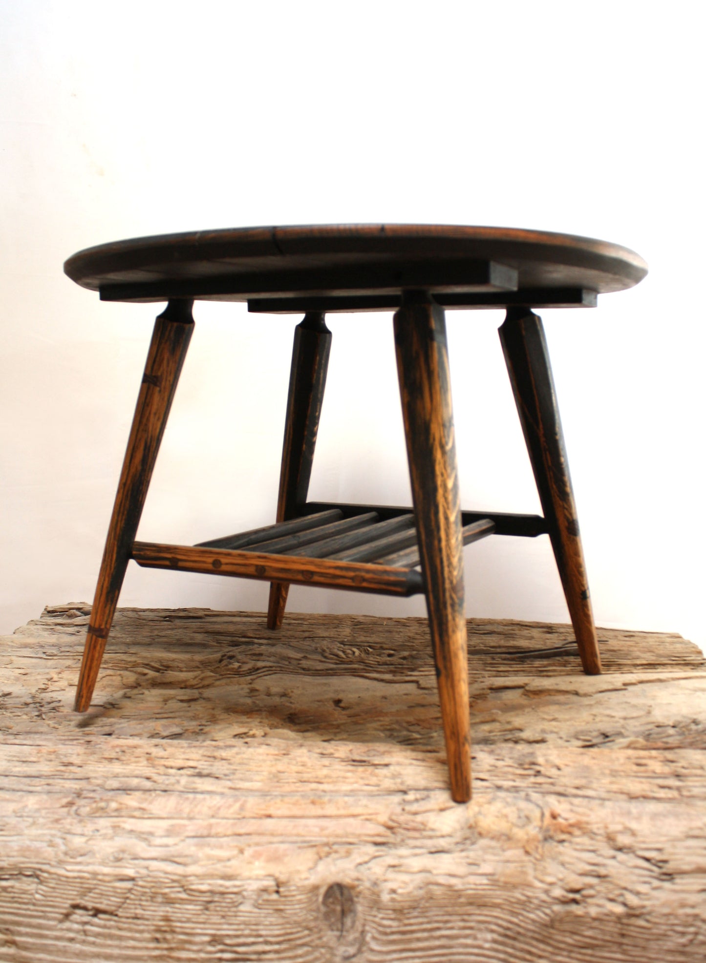 Modern rustic mid-century coffee or side table with traditional joinery and natural grain surface texture