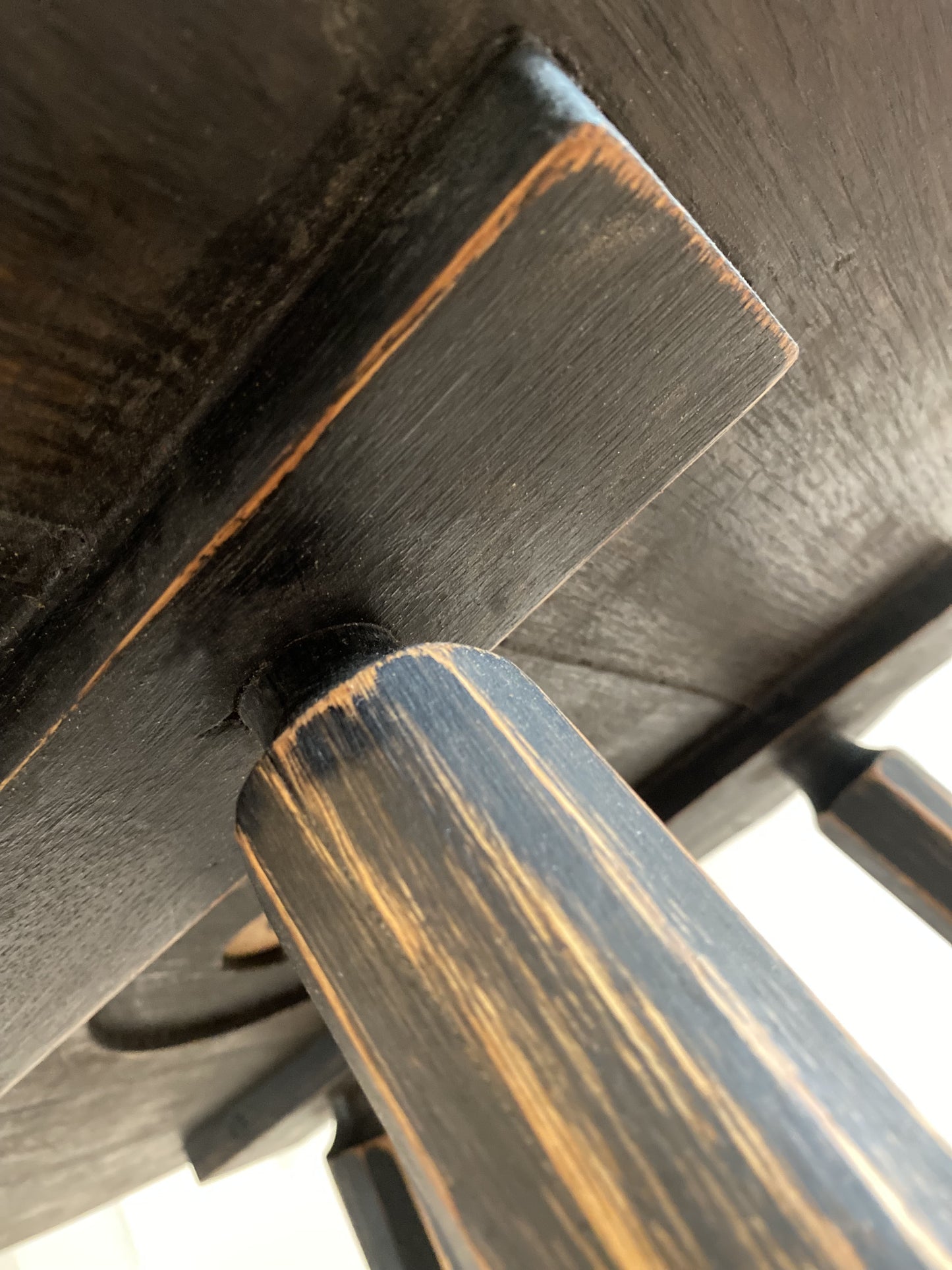 Modern rustic mid-century coffee or side table with traditional joinery and natural grain surface texture