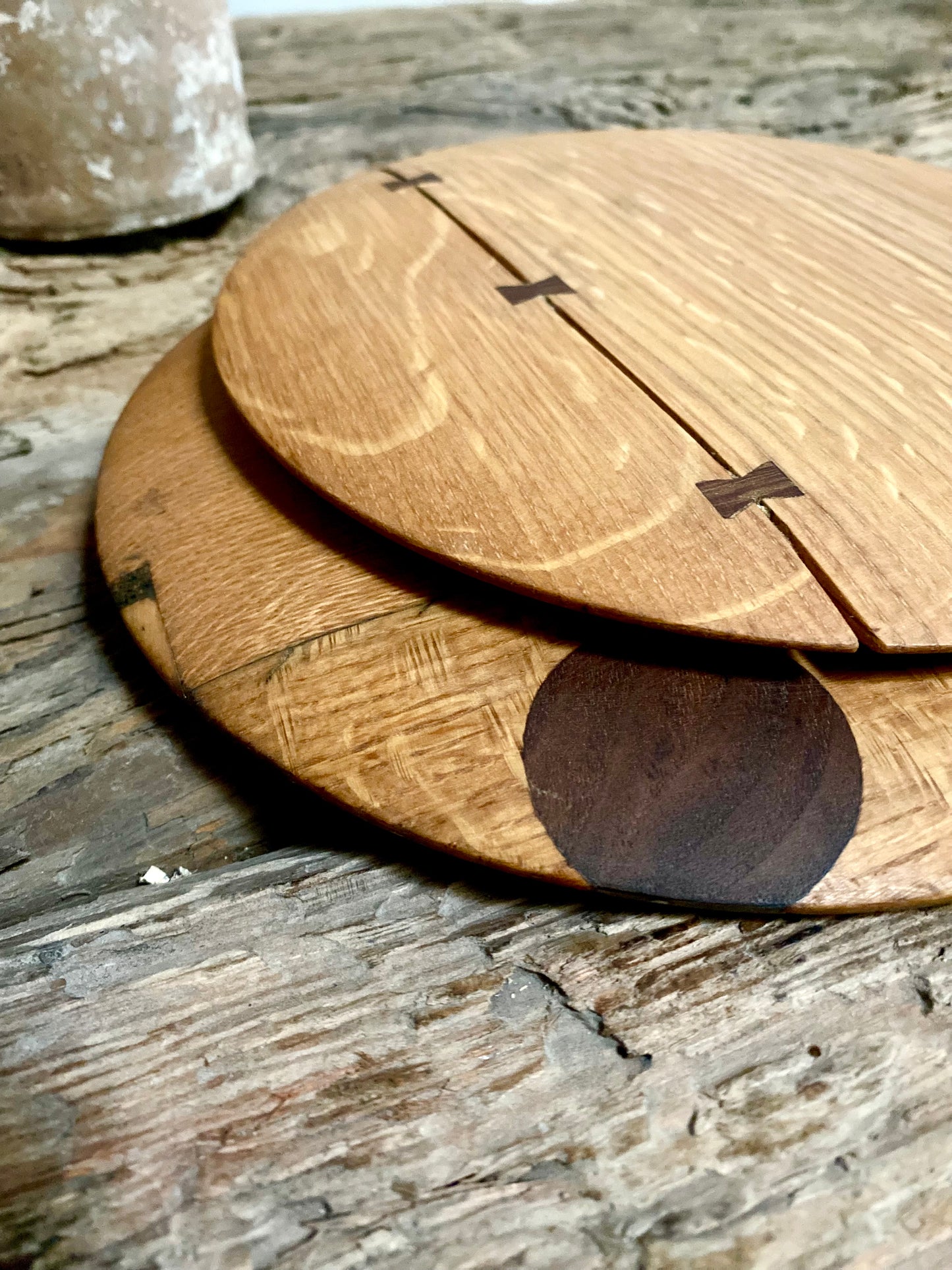 Round cutting serving tray board made with reclaimed oak with traditional walnut bowtie joinery