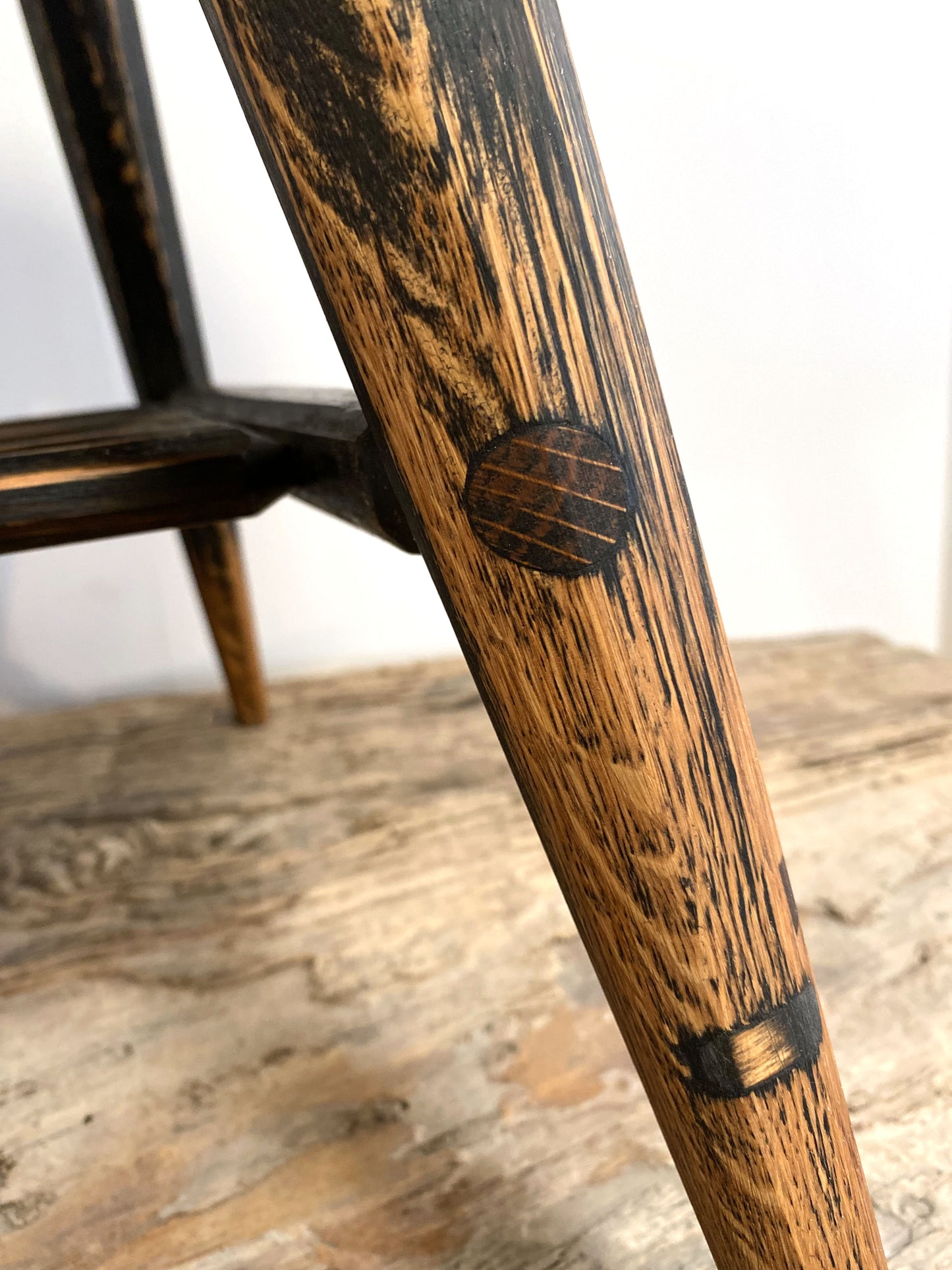 Modern rustic mid-century coffee or side table with traditional joinery and natural grain surface texture