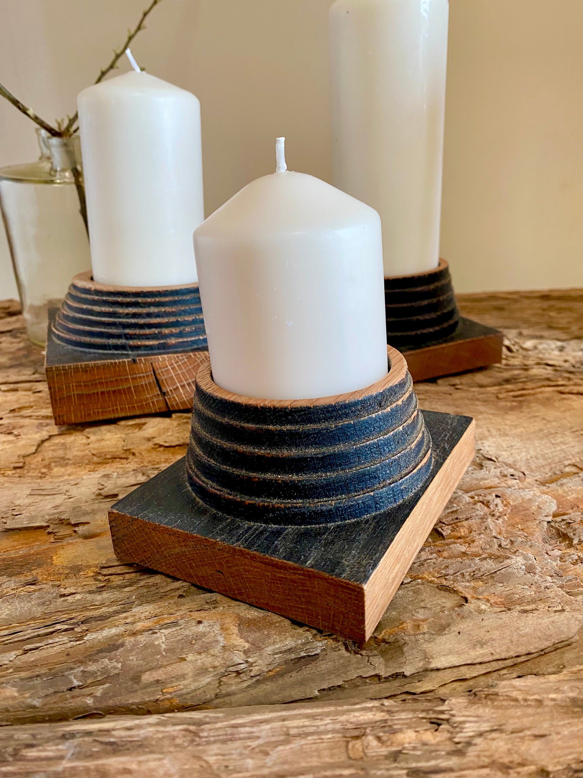 Church candle holder with step design plinth base