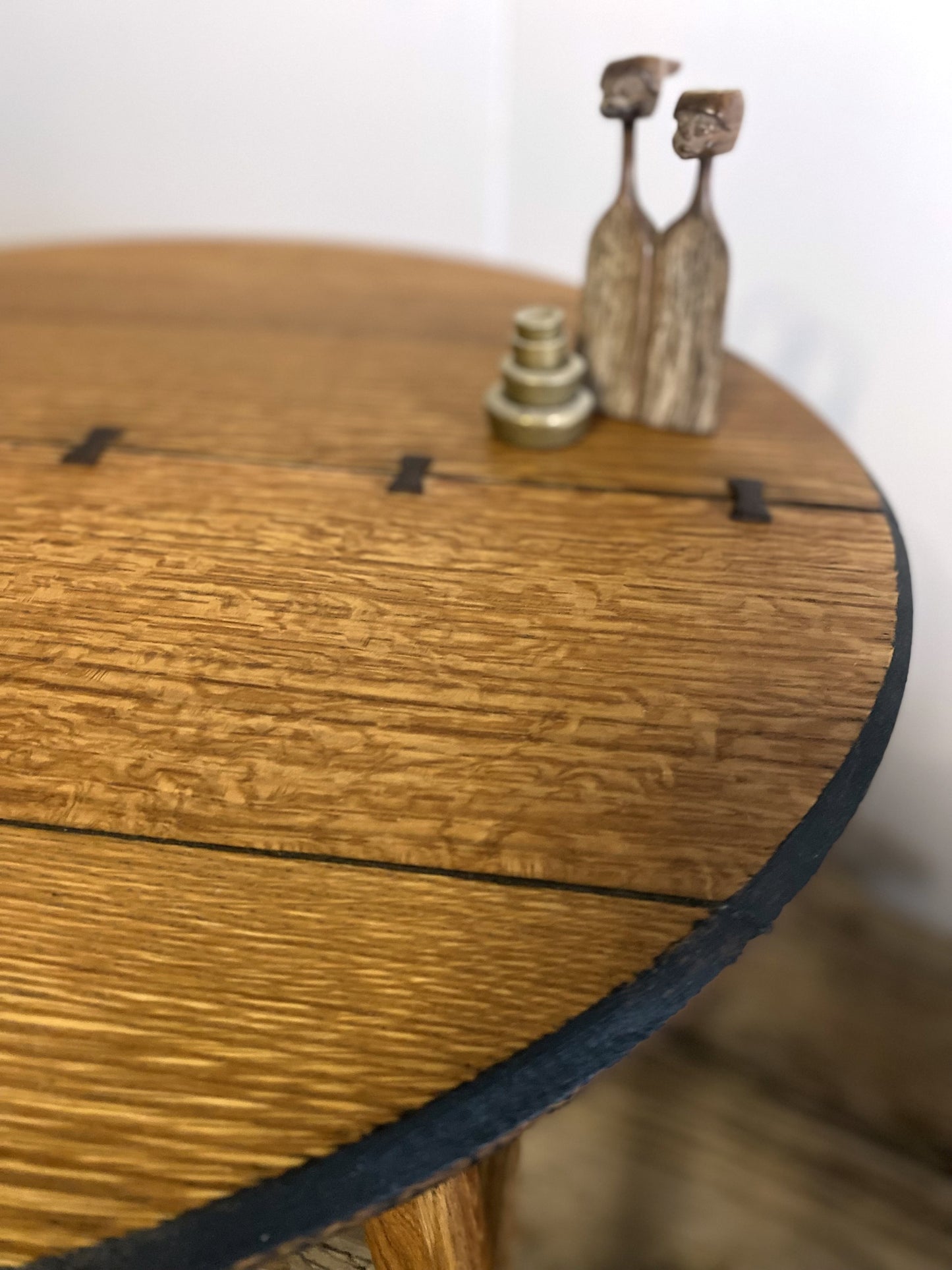 Mid-century designed rustic coffee table with tapered legs and butterfly joinery and authentic oak wood grain