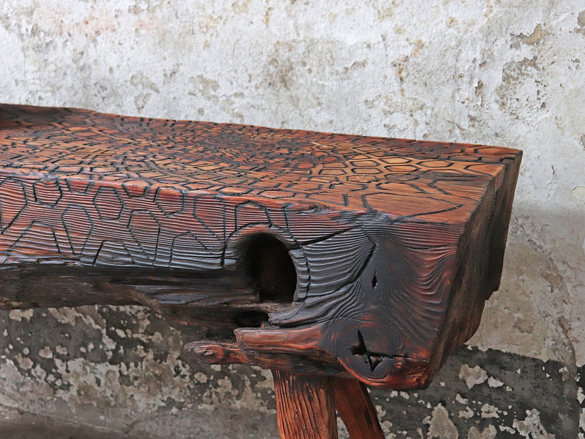 Driftwood bench with carved mandala sacred geometry pattern and stunning surface texture