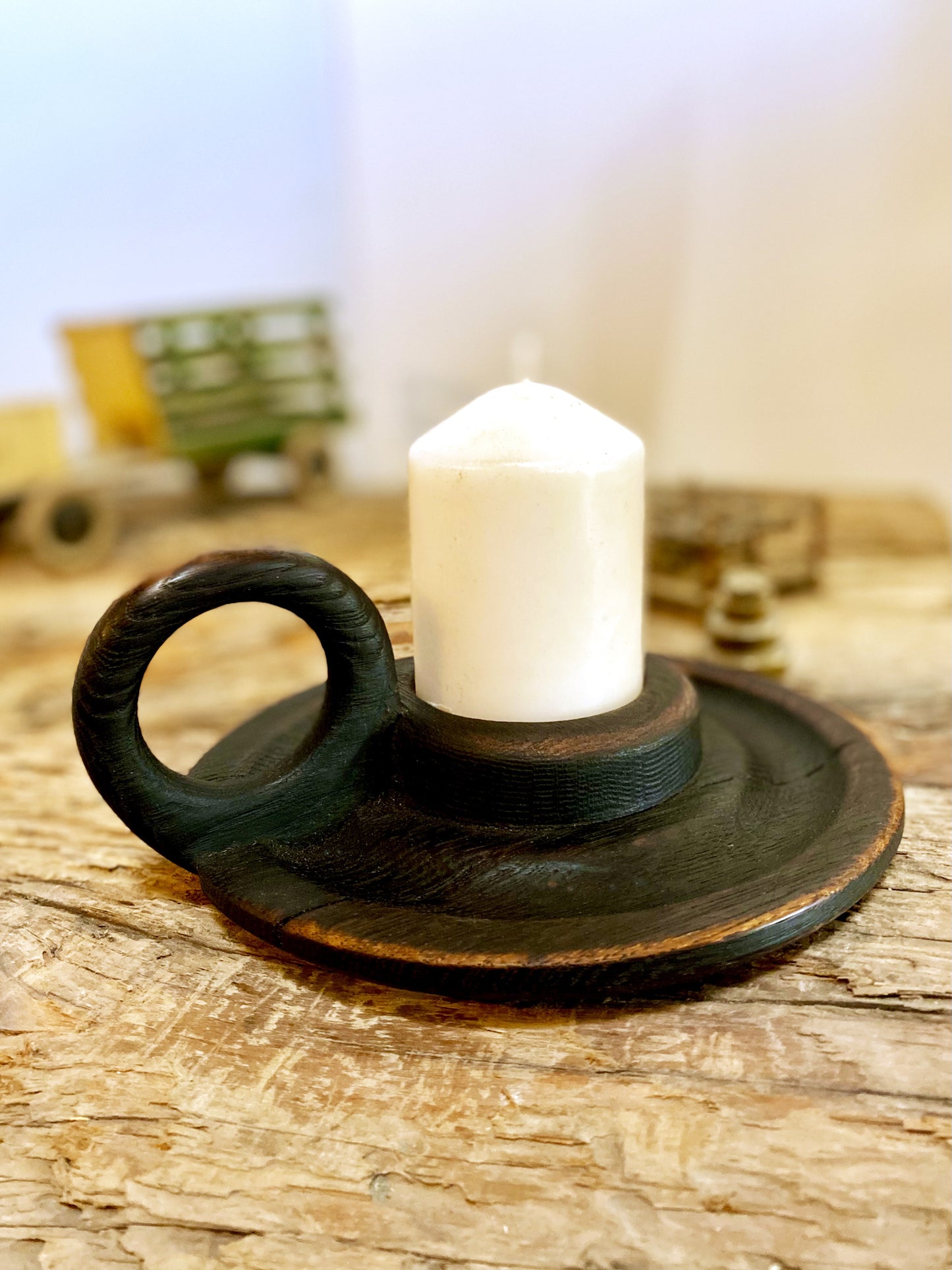 Gothic-inspired candle holder with an elegance classic form and rustic charm handcrafted with a charredpattina texture