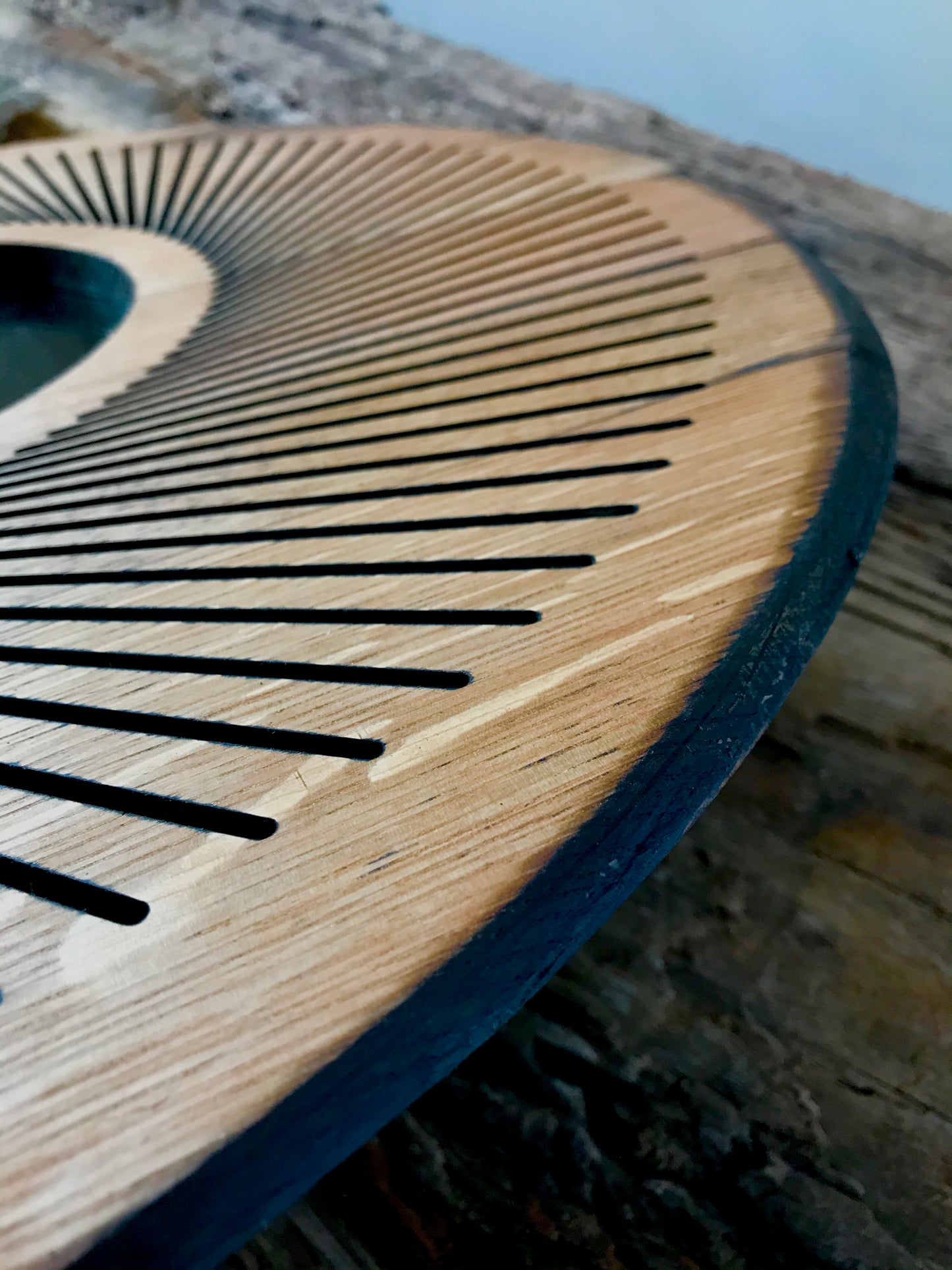 Sacred geometry oak wall mirror upcycled from a whisky barrel lid. Rich patina and original details make this a standout eco-conscious decor piece for any home