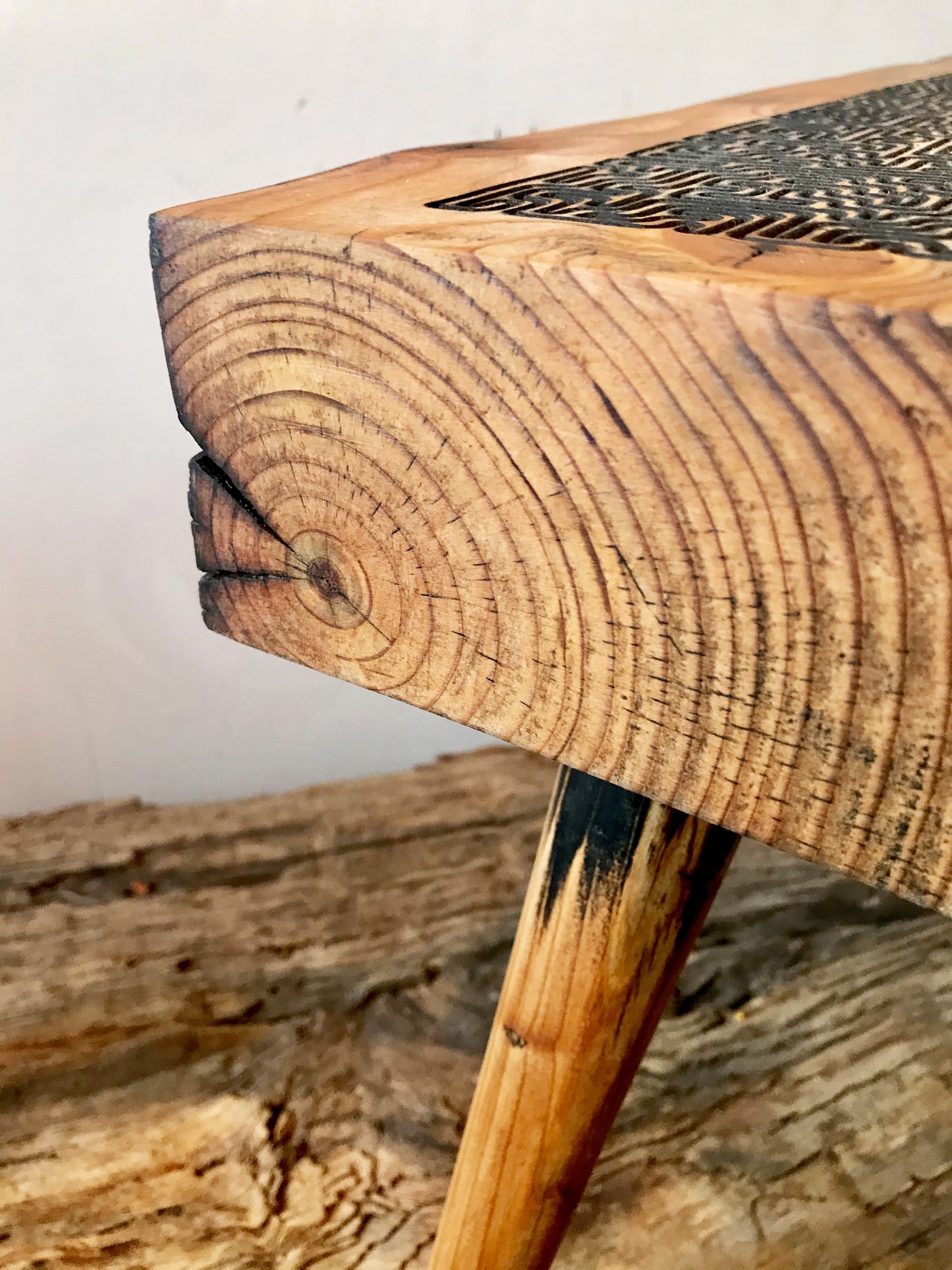 Bench crafted from reclaimed driftwood