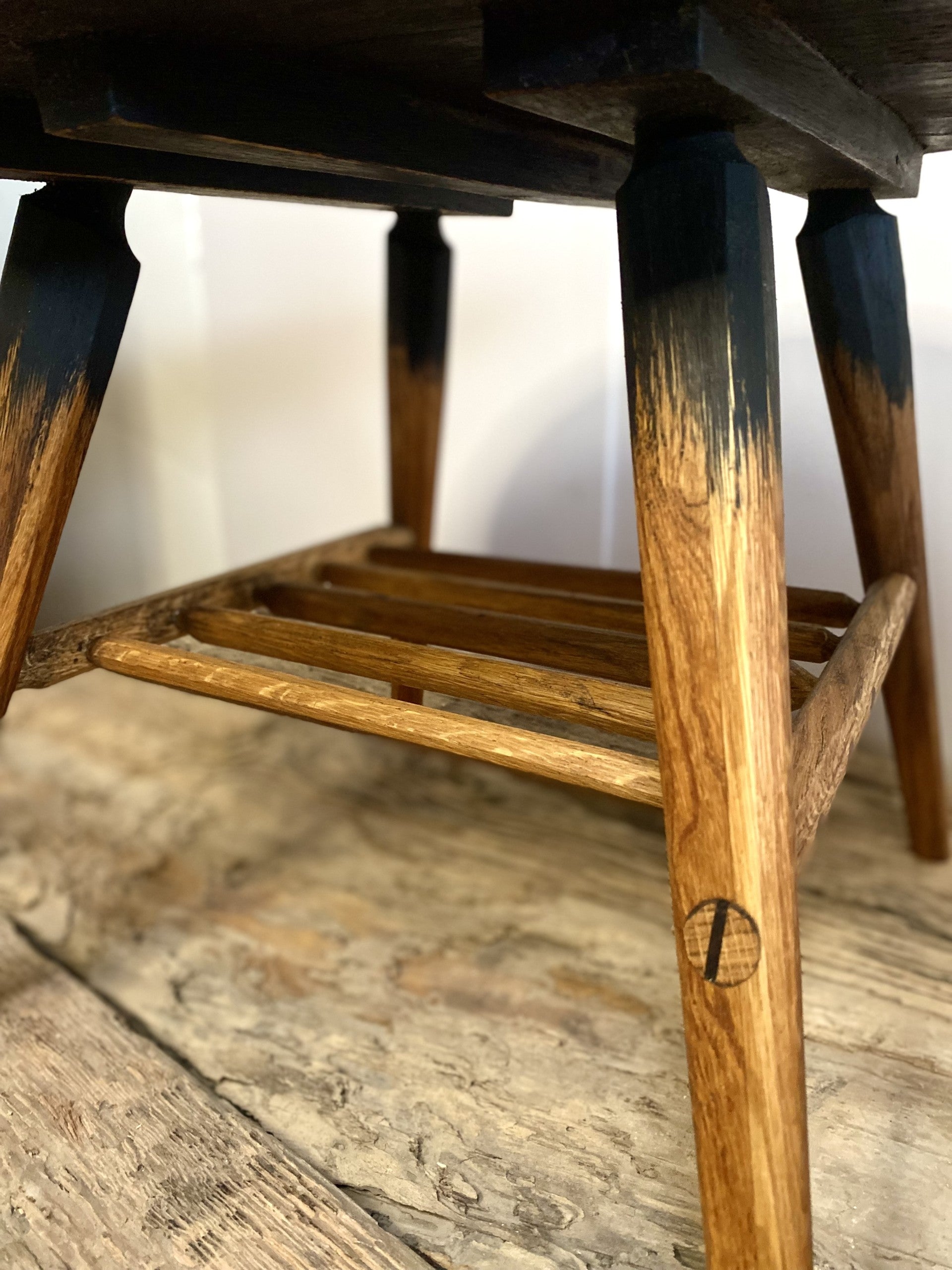 Mid-century designed rustic coffee table with tapered legs and butterfly joinery