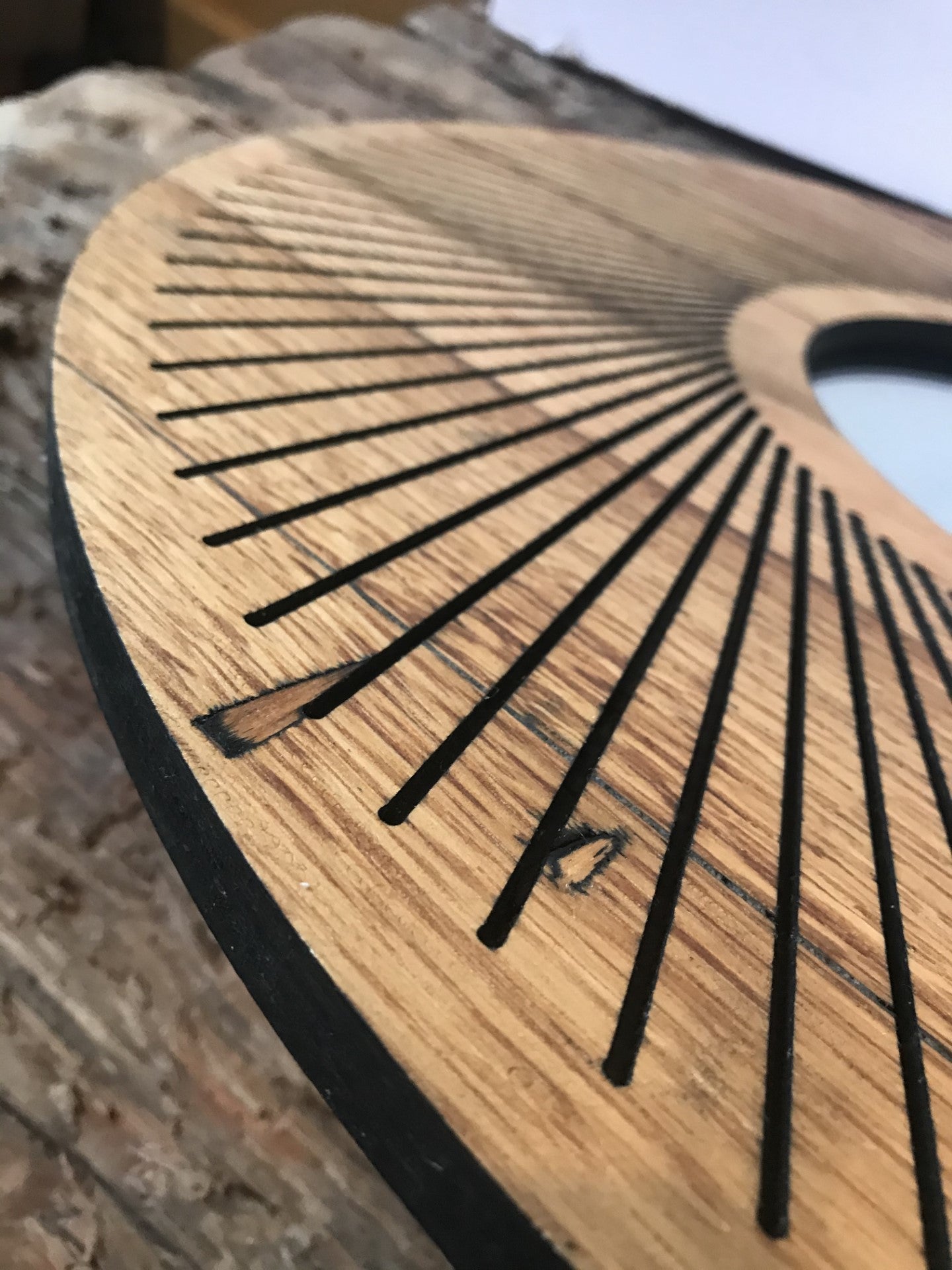 Sacred geometry oak wall mirror upcycled from a whisky barrel lid. Rich patina and original details make this a standout eco-conscious decor piece for any home