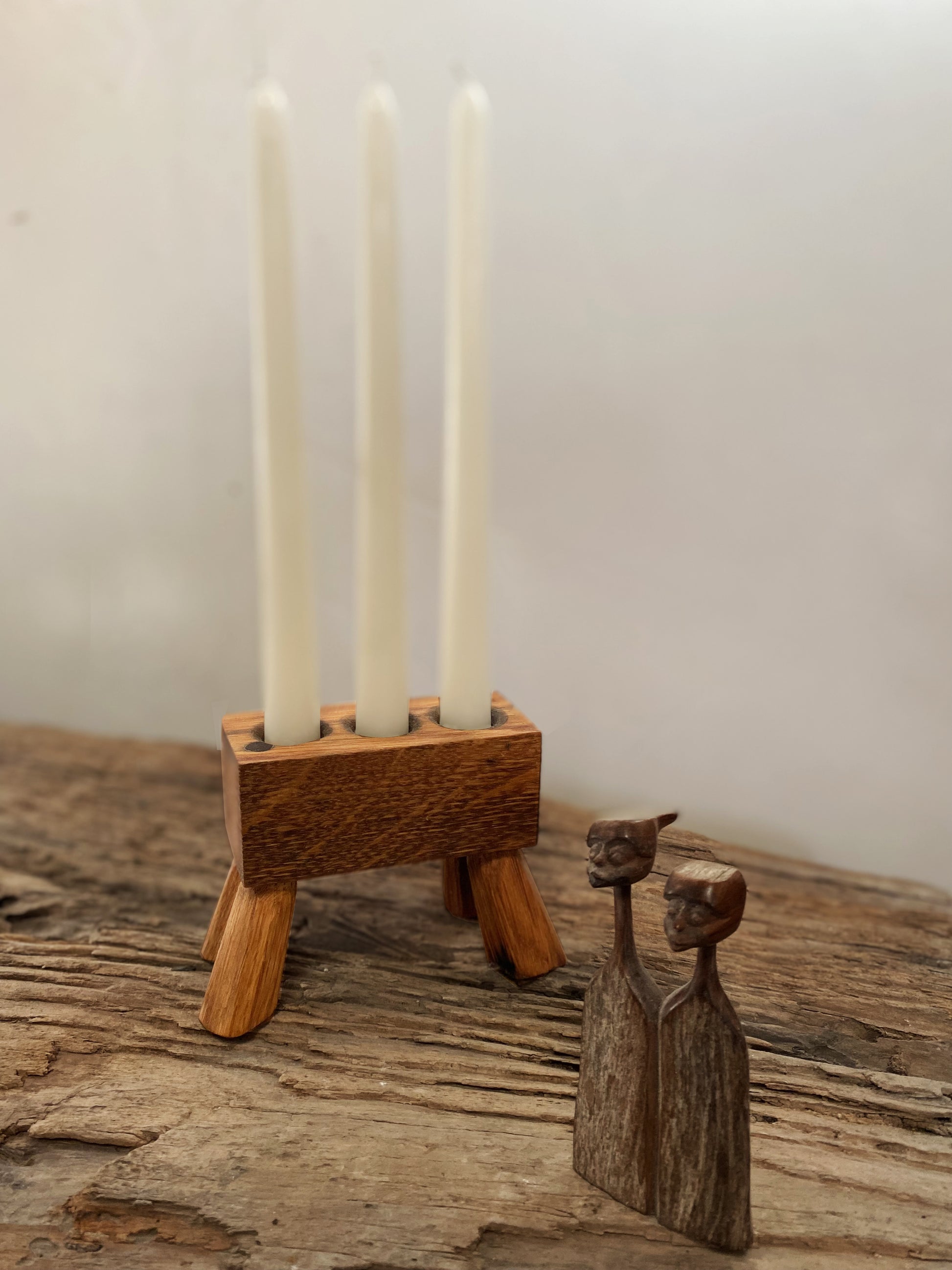 A modern rustic triple-candle holder stand, handcrafted from a reclaimed oak whisky barrel. Perfect for gifting or creating ambient lighting in your favourite place.