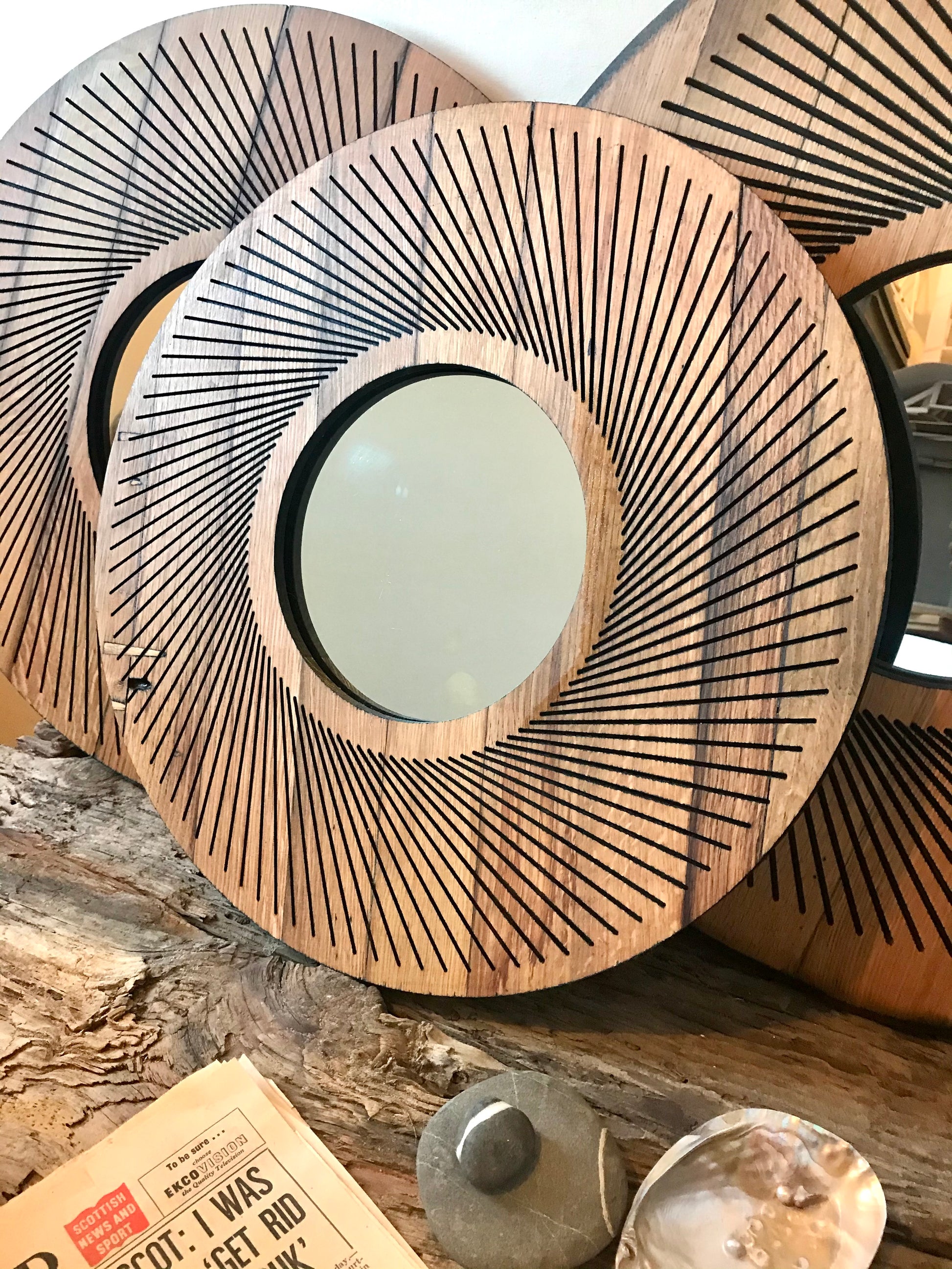 Rustic upcycled oak hanging wall mirror crafted from a reclaimed Scottish whisky barrel lid, featuring a stunning sacred geometry radial pattern. Sustainable, with rich patina and original dowel details, perfect for gallery walls, living rooms, bedrooms, or bathrooms